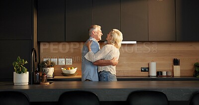 Buy stock photo Smile, hug and old couple in home for support, comfort or bonding together in kitchen. Love, commitment and elderly man with woman for connection with marriage, anniversary and embrace in apartment