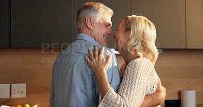 Buy stock photo Love, hug and old couple in home for support, comfort or bonding together in kitchen. Smile, commitment and elderly man with woman for connection with marriage, anniversary and embrace in apartment