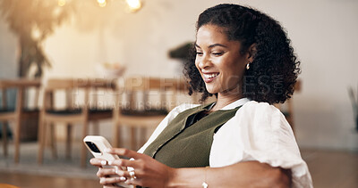 Buy stock photo Relax, phone and smile with African woman on sofa for social media, online update and communication. Reading, tech and person in living room of home with ebook, app download or web subscription