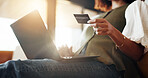Hands, woman or laptop with credit card for online shopping, payment or banking on sofa in home. Female person, user or mobile shopper with debit or computer for ecommerce or remote purchase in house