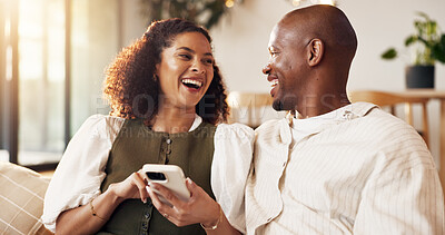 Buy stock photo Couple, relax and laugh in home with phone, online entertainment and funny meme for bonding together. Married, African people and browsing on sofa with tech, humor and social media for internet joke.