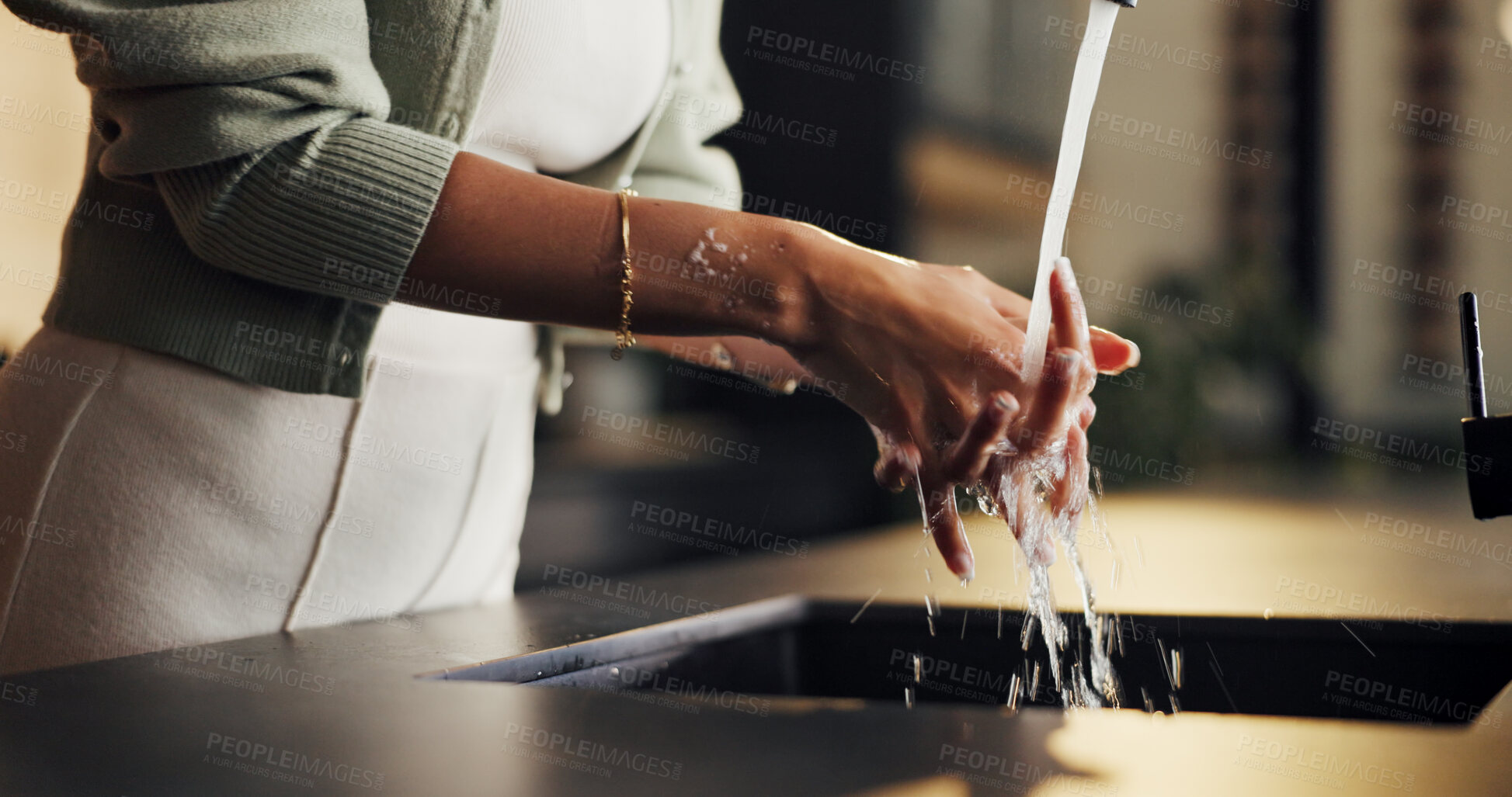 Buy stock photo Hygiene, faucet and woman washing hands in kitchen for healthcare, wellness or disinfectant. Water splash, sink and person cleaning skin for prevention of bacteria, remove dirt or germs in home