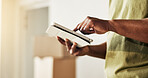Man, hands and scroll in new home with tablet, planning interior design or online shopping for house. Person, browse and moving in apartment with tech, renovation research or purchase for real estate
