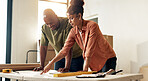 Couple, planning and renovation in new home with blueprint, property upgrade or interior design. Married, African people and house improvement with layout document, remodeling project or DIY together