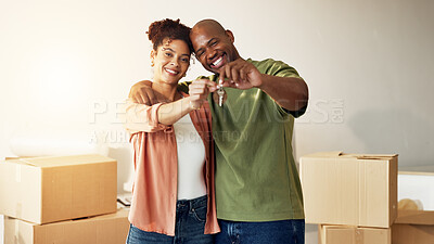 Buy stock photo Moving, portrait and couple with key in new house, hug and happy with property investment or success. African people, smile and confident with milestone, real estate and mortgage opportunity in home