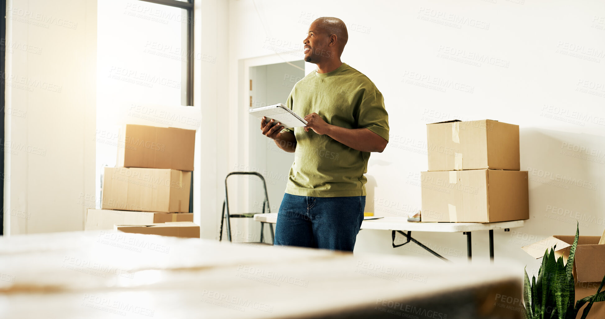 Buy stock photo Interior design, tablet and thinking with black man in new house for diy project or renovation. App, inspiration and planning with happy homeowner in apartment for development or home improvement