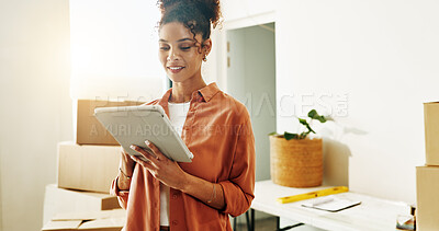 Buy stock photo Woman, reading and tablet in new home for interior design, remodeling ideas and planning with app. Person, real estate and tech in lounge for online inspiration with smile for decoration decision
