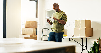 Buy stock photo Man, research and moving in new house with tablet, check interior design trends and renovation idea. Black person, browsing and planning in home with tech, remodeling project and property investment.