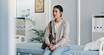 Thinking, woman and waiting in hospital with anxiety, appointment and concern for medical results. Thoughts, female person and nervous patient for checkup, healthcare services and worry for diagnosis