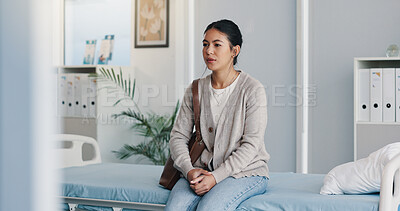 Buy stock photo Thinking, woman and waiting in hospital with anxiety, appointment and concern for medical results. Thoughts, female person and nervous patient for checkup, healthcare services and worry for diagnosis