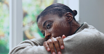Buy stock photo Black woman, thinking and window in living room for anxiety, overthinking or loss with pressure. Trauma, reflection or female person with depression in home with stress for mental health crisis