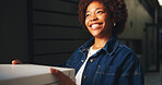Box, delivery and smile of black woman at front door for home logistics or order shipping. Courier service, package and thank you with happy person at entrance to apartment for online shopping