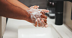 Health, washing hands or person in house with soap, bacteria removal or sanitation in wellness routine. Safety, clean or man with disinfectant, germ protection or hygiene habit in virus prevention.