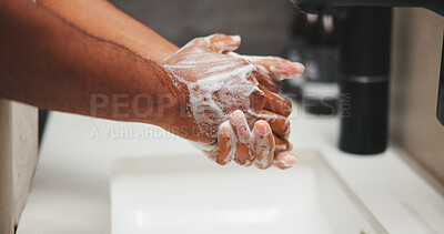Buy stock photo Health, washing hands or person in house with soap, bacteria removal or sanitation in wellness routine. Safety, clean or man with disinfectant, germ protection or hygiene habit in virus prevention.