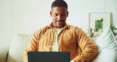 Buy stock photo Laptop, relax and man on sofa in home for remote work on software development project in living room. Smile, computer and male frontend engineer with online programming for freelance career in house.