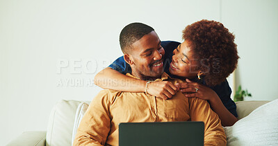 Buy stock photo Smile, hug and couple in home with laptop, research and browsing website with affection. Happy, African people and embrace in lounge with tech, streaming movies and bonding together for weekend break