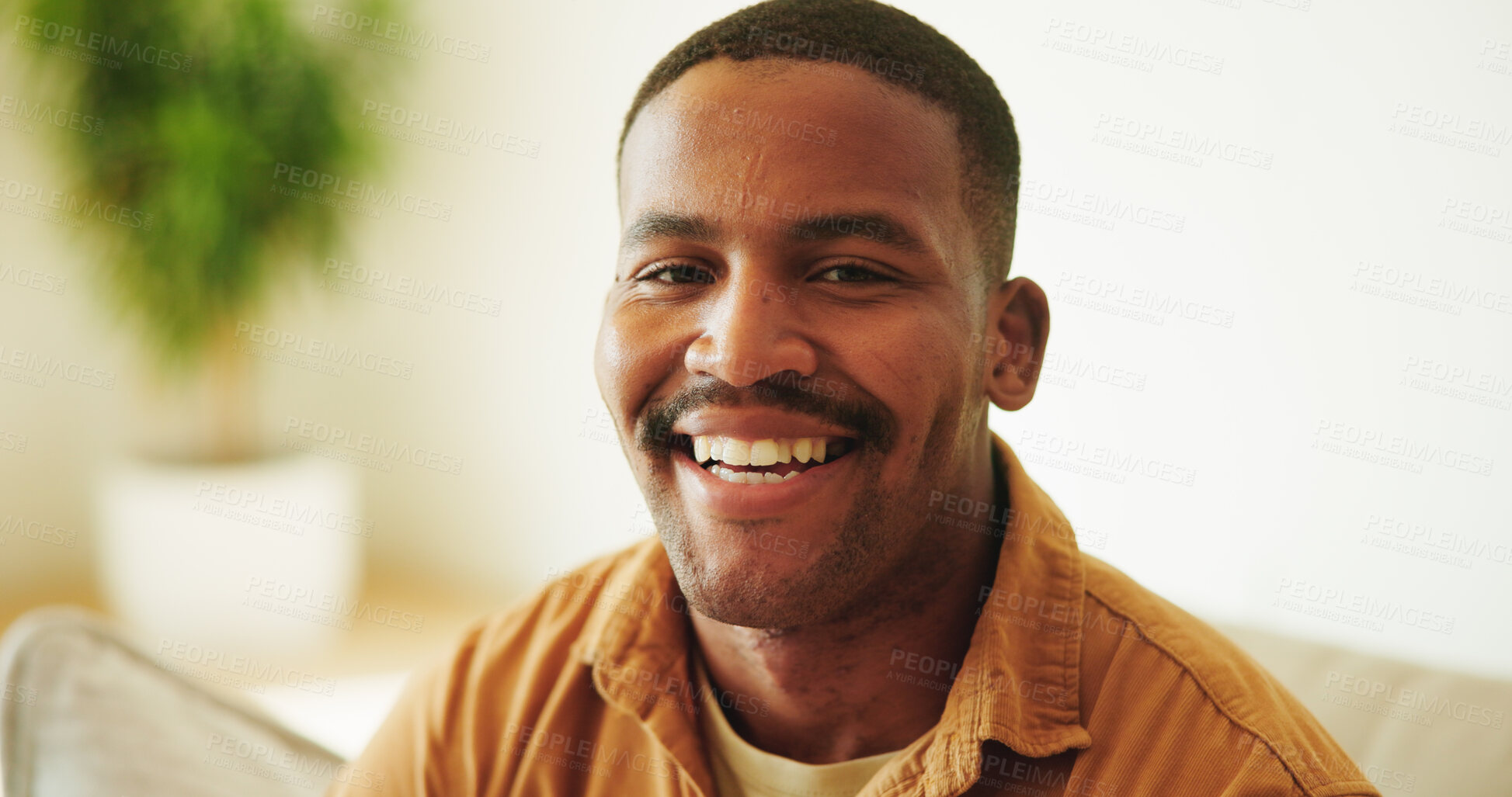 Buy stock photo Wellness, happy and black man on sofa with portrait, positive attitude and optimism on day off. Wellbeing, smile and person in house with good mood, confidence and satisfaction in living room.