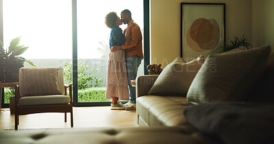 Buy stock photo Love, kiss or couple in house with hug, partner affection or bonding together in connection. Tender, embrace or people with emotional security, romantic moment or commitment in healthy relationship.