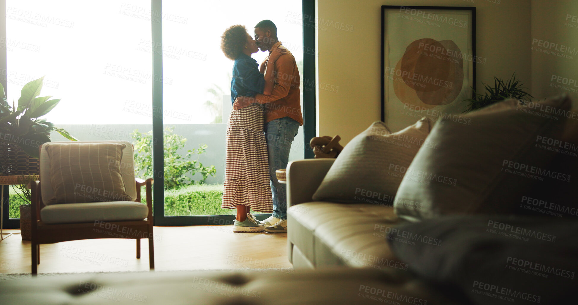 Buy stock photo Love, kiss or couple in house with hug, partner affection or bonding together in connection. Tender, embrace or people with emotional security, romantic moment or commitment in healthy relationship.