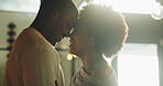 Laughing, couple and bonding on break, home and commitment for relationship, love and forehead touch. Happy, black people and connection with partner on weekend, support and romance in apartment