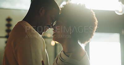 Buy stock photo Laughing, couple and bonding on break, home and commitment for relationship, love and forehead touch. Happy, black people and connection with partner on weekend, support and romance in apartment