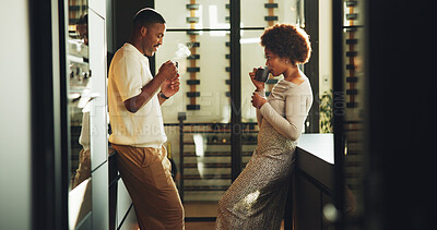 Buy stock photo Morning, couple and drinking coffee in kitchen with bonding together, love and relationship commitment. Married, black people and drink tea in home with smile, care and connection on weekend break.