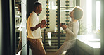 Couple, laugh and coffee in kitchen with bonding together, relationship and funny joke for connection. Happy, married black people and warm drink in home with humor, care and relax on weekend break.