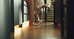 Couple, legs and romance in home, tiptoe and bonding with partner on weekend, connection and support. People, together and commitment for relationship, feet and affection for spouse or love in house