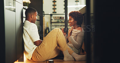 Buy stock photo Morning, coffee and couple in kitchen with conversation, bonding together and smile for connection. Space, married black people and relax in home with warm drink, care or discussion on weekend break.