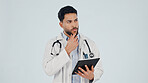 Doctor, man and thinking with tablet in studio for healthcare procedure on a white background. Thoughtful, male person or health worker contemplating with technology for medical solution or research