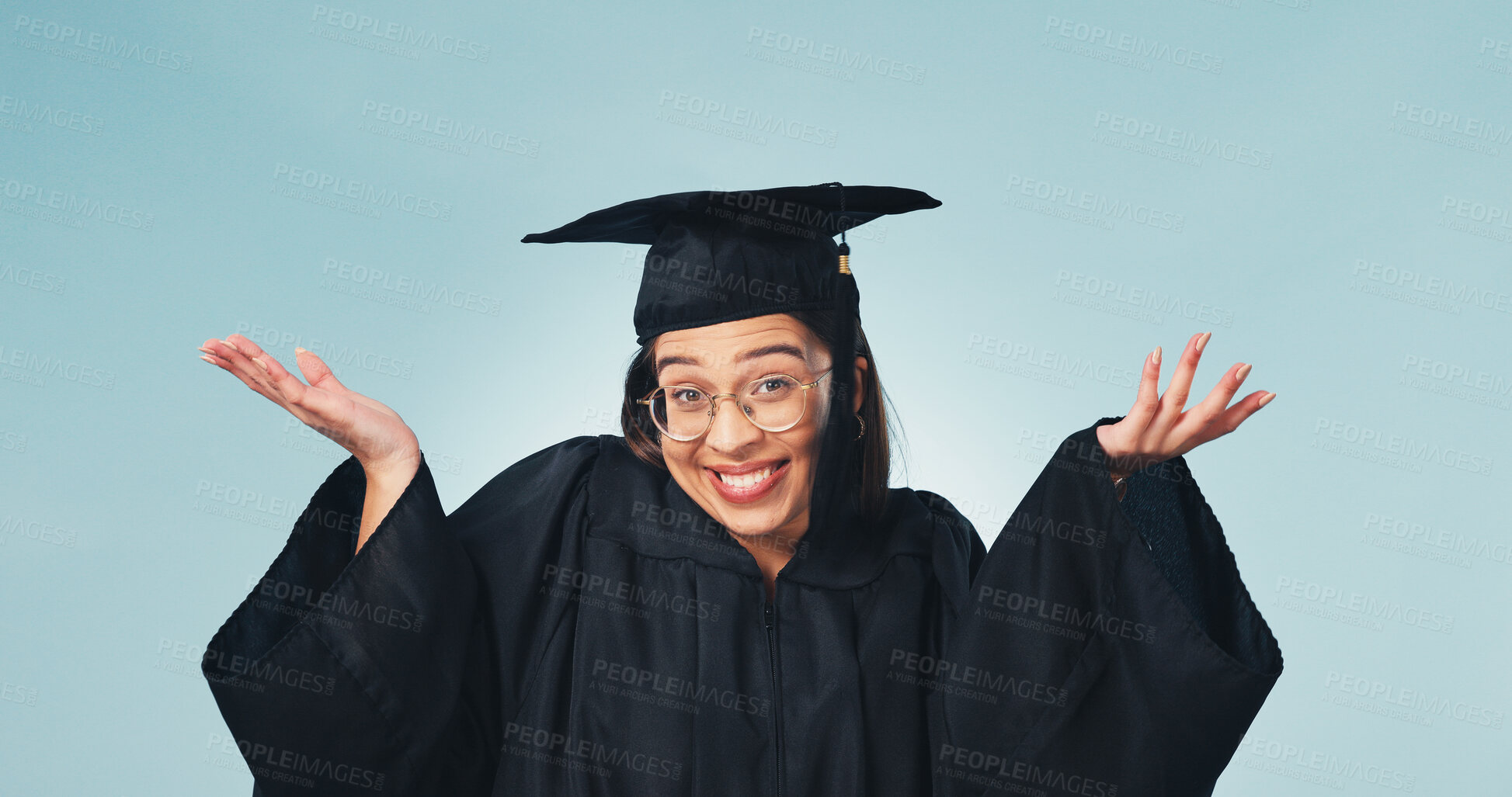 Buy stock photo Decision, portrait and woman in studio for graduation, future career and confused for opportunity. Shrug, space and graduate unsure for university, education and academic choice on blue background