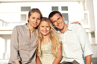Buy stock photo Portrait, smile and family at house with love, connection and bonding at holiday retreat. Happy, people and daughter at accommodation with embrace, weekend break and summer vacation at getaway resort