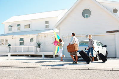 Buy stock photo Home, travel and family outdoor with luggage, road trip and adventure at holiday house. Parents, walk and daughter at getaway accommodation with suitcase, vacation break and parked car at destination