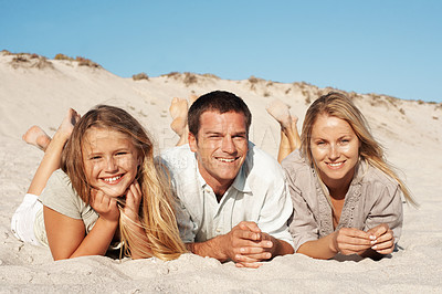 Buy stock photo Portrait, parents and relax with kid at beach for love, adventure and bonding together on holiday. Space, people and rest at sea with daughter, connection and happiness on sand for tropical vacation