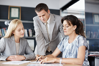 Buy stock photo Documents, meeting and business people in office for financial review, planning and investment decision. Corporate, team and workers with paperwork for finance report, budget proposal and discussion