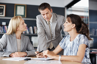 Buy stock photo Documents, talking and business people in office for financial review, planning or investment choice. Corporate, team and workers with paperwork for finance report, budget proposal and discussion