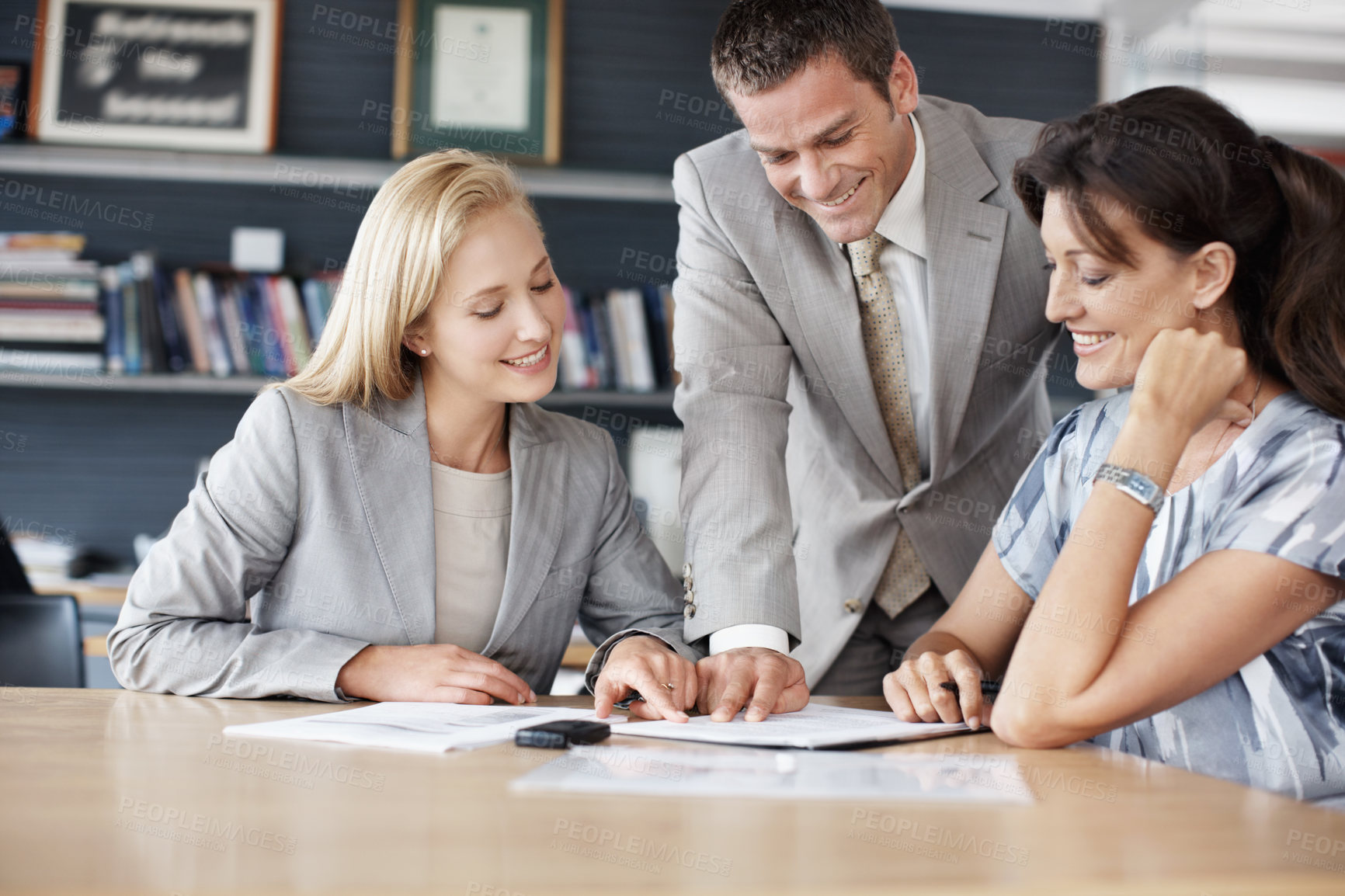 Buy stock photo Meeting, happy and business people in office for financial review, planning and investment decision. Corporate, team and workers with documents for finance report, proposal and strategy for profit