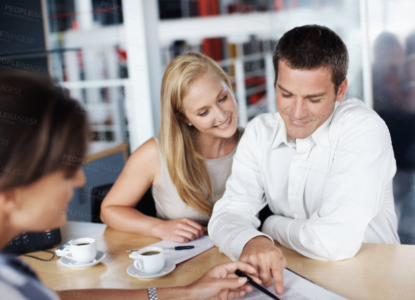 Buy stock photo Advice, couple and financial advisor with document for consulting, insurance plan or investment. Discussion, help and woman broker with people for meeting, loan application or information in office