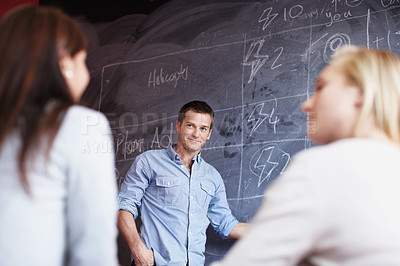 Buy stock photo Business, planning and people in meeting, conversation for creative project and feedback for ideas. Group, man and women in workplace, blackboard and collaboration for proposal, support and schedule
