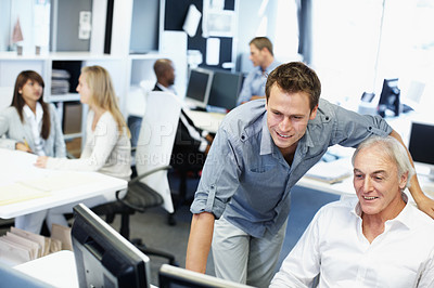 Buy stock photo Business, people and reading in office with computer, research and training for accounting. Men, team and coworking in workplace with pc, financial report and mentor assistance on investment proposal
