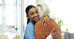 Happy, caregiver and old woman in nursing home with hug, healthcare assistance or support for kindness. Nurse, smile and elderly person in consultation with embrace, medical help or bonding together.