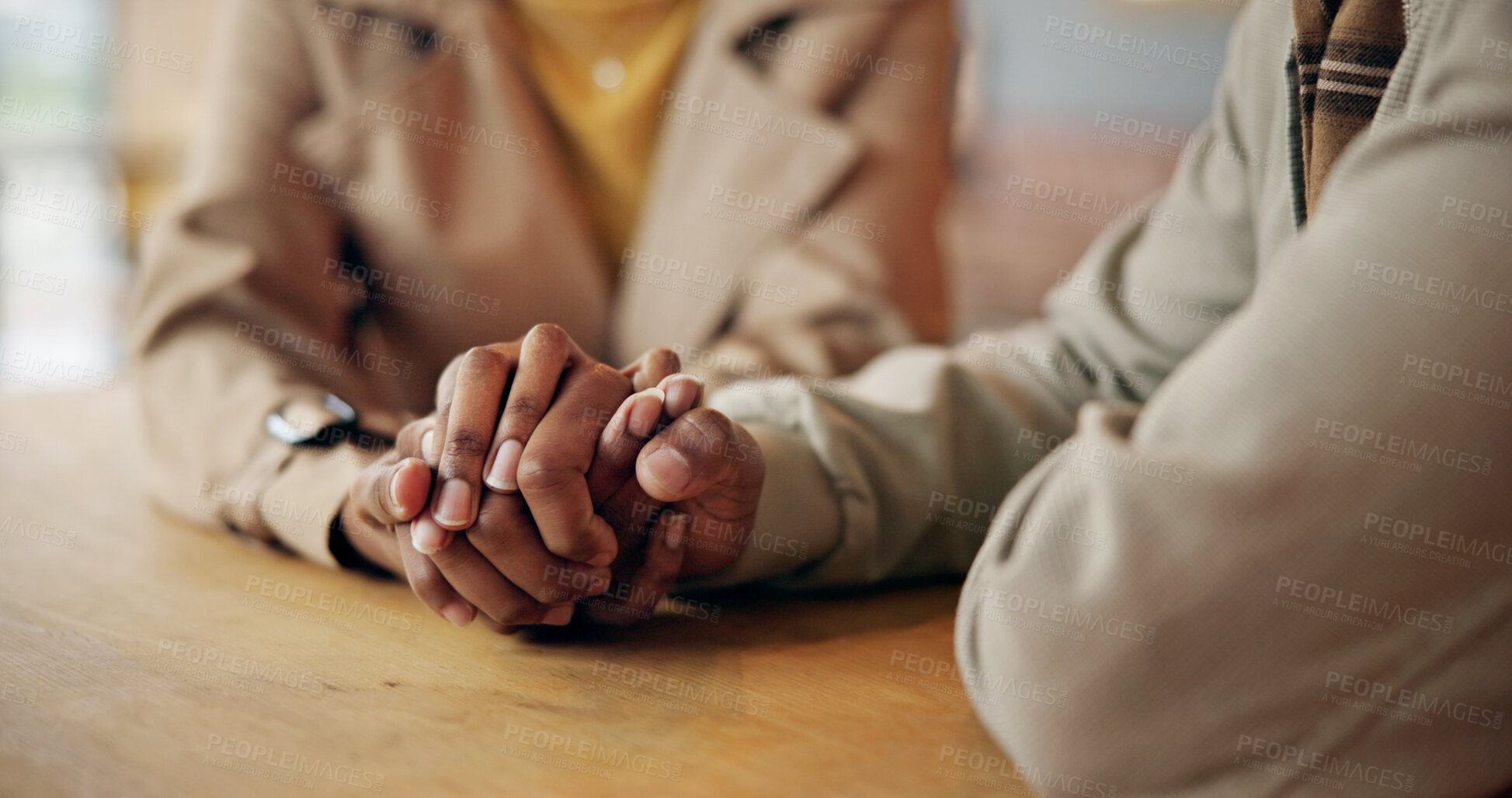 Buy stock photo Holding hands, support and couple in cafe on date together for love, communication or anniversary. Connection, care or people bonding in coffee shop for commitment, romance and gratitude or respect