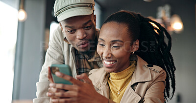 Buy stock photo Phone, happy and black couple in cafe with texting, chatting or social media post in morning. Smile, technology and man with woman on cellphone for reading blog with restaurant review in coffee shop.