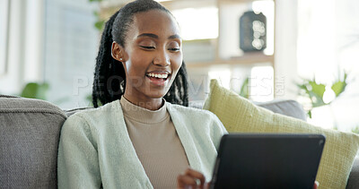Buy stock photo Woman, online and laughing with tablet in lounge, entertainment and watching movie with subscription. Happy, black person and streaming funny video with tech, relax and chilling on couch in house