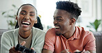 Relax, laugh and black couple with video game in home for fun challenge, esport date or bonding. Portrait, happy people or gamer contest on sofa for weekend entertainment, relationship or multiplayer