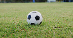 Ground, space and sports with ball on soccer field for activity, competition or outdoor hobby. Fitness, green grass and training with object on empty pitch for start of game, match or tournament