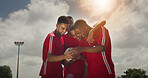 Soccer, team and men with phone, sports field and watching training tips on social media or fitness. Outdoor, athlete and happy people with mobile, online and skill development with tutorial on web