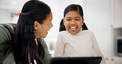 Buy stock photo Daughter, laughing and mother with tablet in kitchen of home for child development or learning. App, funny or love with girl and single parent woman in apartment for bonding or online streaming
