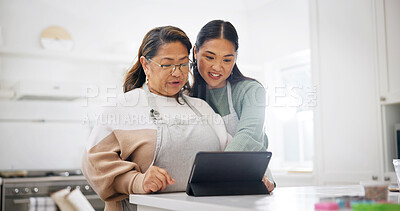 Buy stock photo Cooking, old woman and family with tablet in kitchen, watch or searching for recipe on social media. Happy people, online and meal prep with senior mom, talking and learning culinary skills in house