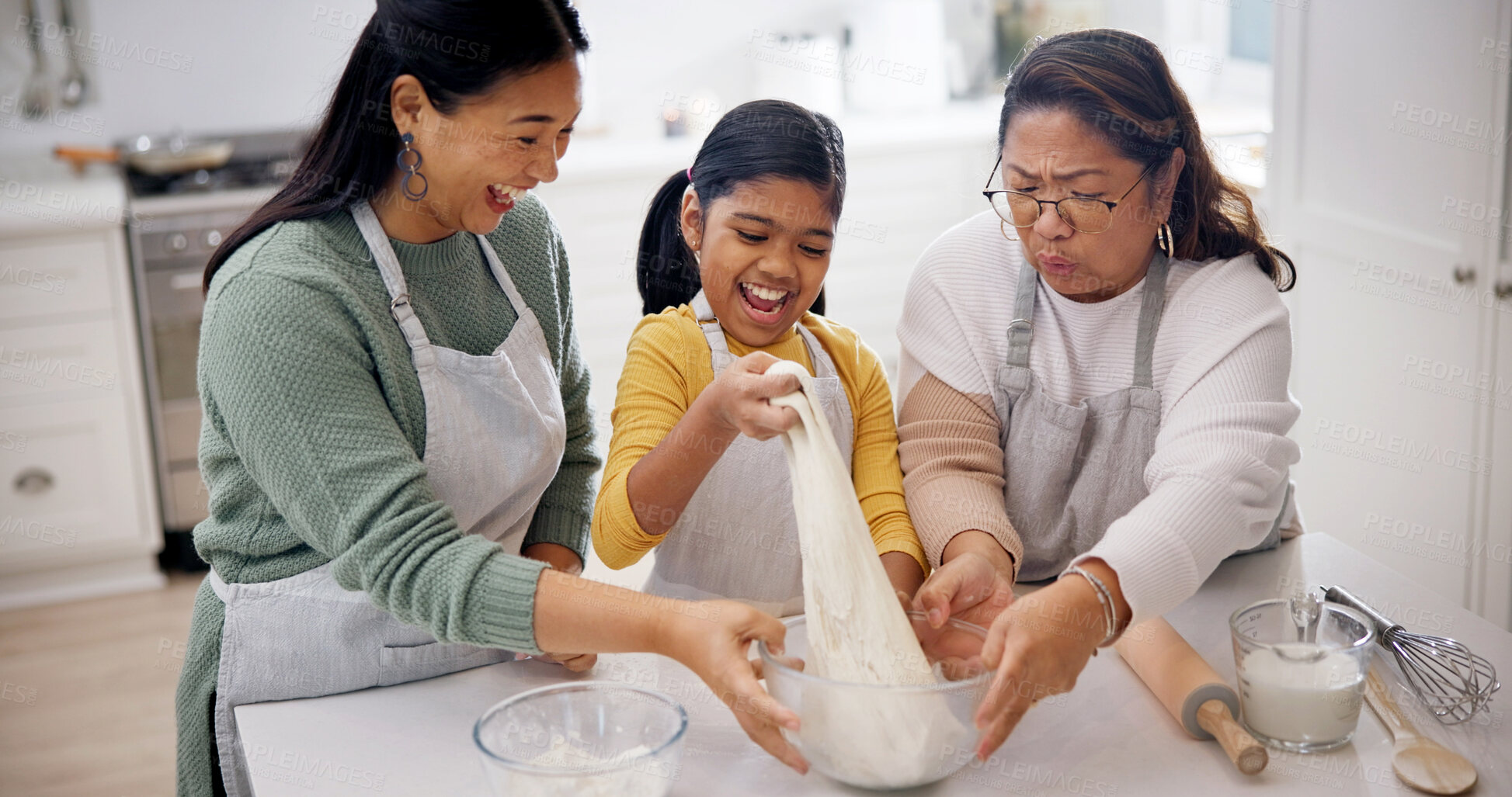 Buy stock photo Happy, mom and grandmother with child baking in kitchen with dough for playful bonding together. Mother, grandma or generations with smile, daughter or junior baker for ingredients or bowl in home